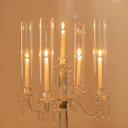 Candelabrum with multiple candles against a warm beige background