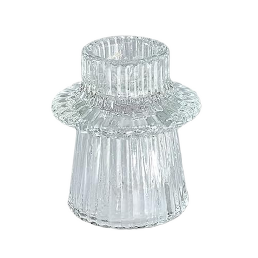 Clear glass candle holder on a white background