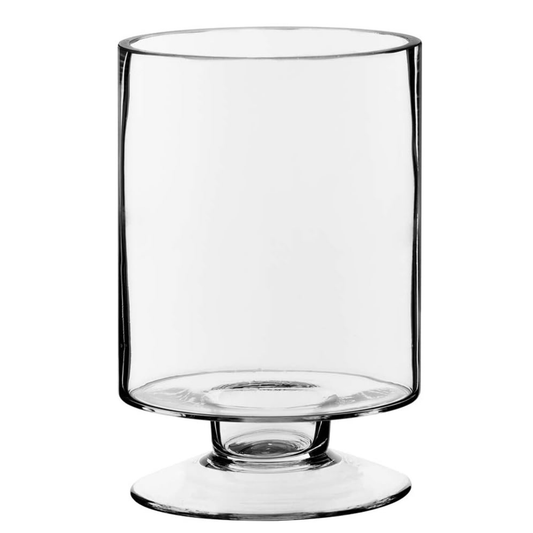Clear glass with footed base on a white background