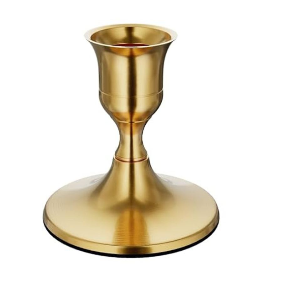 Gold candle holder on a white background